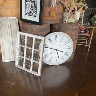 a clock, a window, and a chair