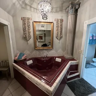 Heart shaped jacuzzi in honeymoon suite