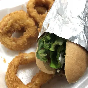 a sandwich and onion rings