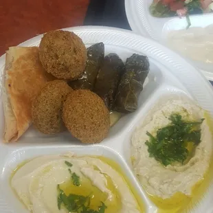 Part 1 of the Vegetarian plate ... eggplant dip, hummus, falafel, grape leaves, spanakopita