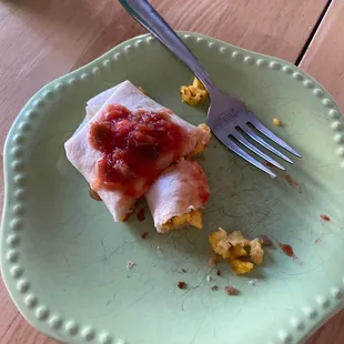 Tried to make the best of it by microwaving. Couldn't do it. Also, this is half of the $5 burrito I ordered.