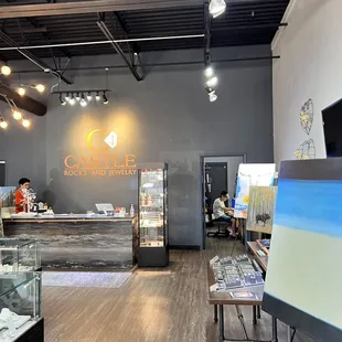 Service counter and jeweler working
