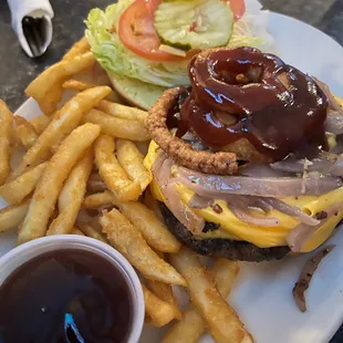 a burger and fries with ketchup