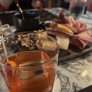 Charcuterie board and Old Fashioned
