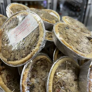 a pile of pies on a plate