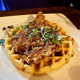 Cornflake fried chicken, jalapeño cheddar waffle, hot honey, whipped maple butter