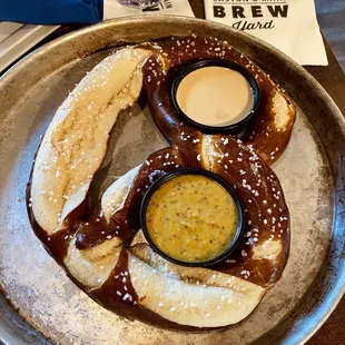 Giant soft pretzel with brew cheese and whole grain mustard