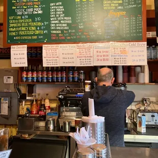 a man working behind the counter