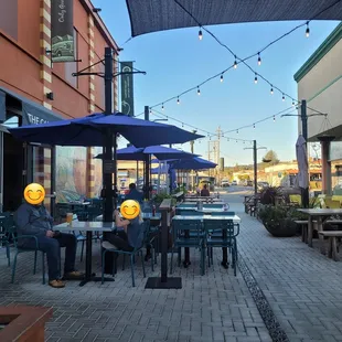 Outdoor seating in front of The Cannery, in alleyway between the Castro Valley Marketplace and Vietnamese restaurant, Wend's Place.