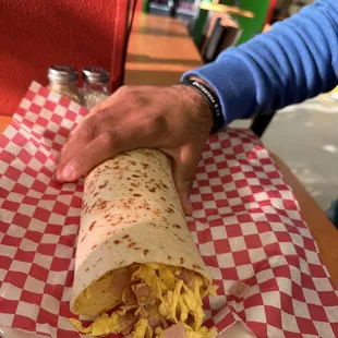 Ham and egg with beans Burrito. Didn&apos;t expect it to be this BIG!