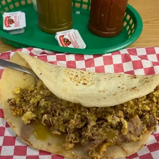Chorizo and egg with beans breakfast taco