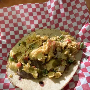 A la mexicana taco with beans. Really good! The flour tortillas are home made and delicious!