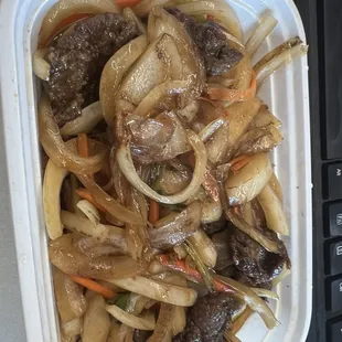 beef and noodles in a styrofoam container