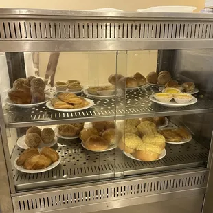a display case of baked goods