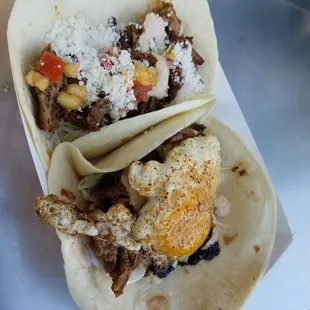 Jerk chicken and pork bulgogi tacos