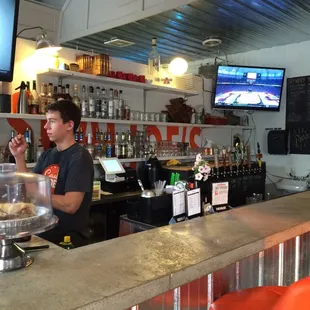 a man sitting at the bar