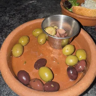 Olive plate half eaten or maybe more than half