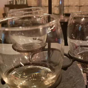 three wine glasses on a table