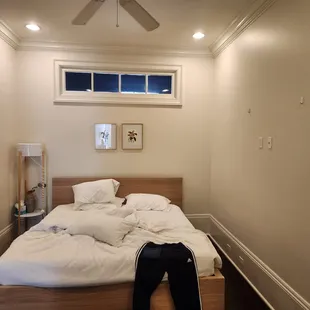 No furniture in the bedroom for clothes.  No tv in the bedroom.