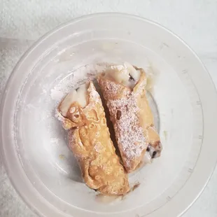 two pieces of pastry on a plate