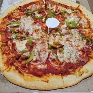 Ordered a Brooklyn-style pizza with bell pepper and onions, and received a pizza with just onions and bell peppers.