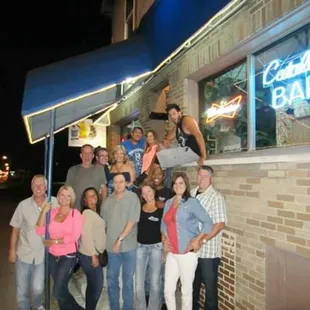 a group of people standing outside