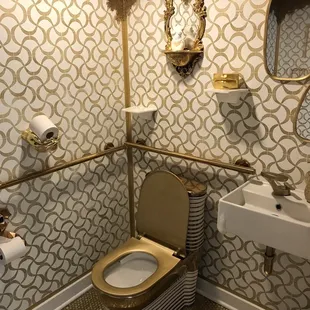 a bathroom with a toilet and sink