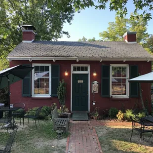 Front of the restaurant with outdoor seating.