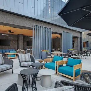 outdoor seating area with tables and chairs