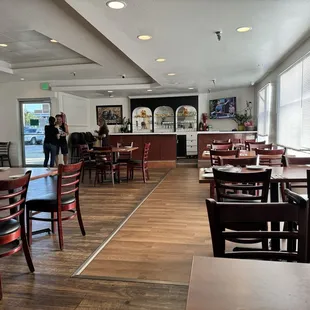 Indoor seating with ample space for office parties. High heels clack loudly on the hardwood floor.