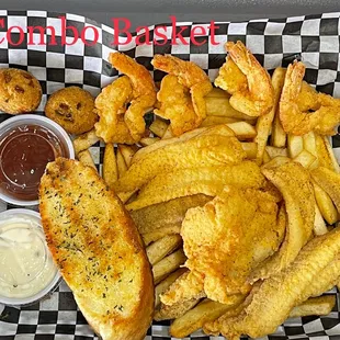 a basket of fried fish and fries