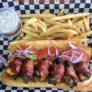6 Medium Shrimp with Jalapeños wrapped with bacon stuffed into a hoagie bread