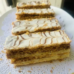 three pieces of cake on a plate