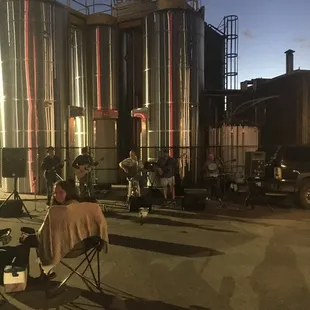 a man sitting in a folding chair