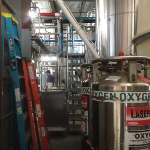 bathroom is on the left of picture. I can see some drunk opening the valve on bottles to be funny