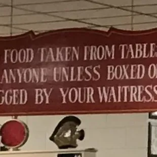 No food taken from tables by anyone, unless boxed or bagged by your waitress.