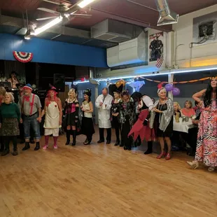 Lights are on.  Time to select the Halloween Dance costume winners.