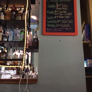 Daily specials board on the wall of the left side of the bar