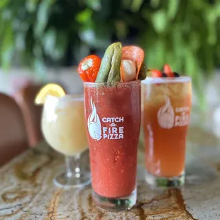 ows a bloody drink with a garnish garnish