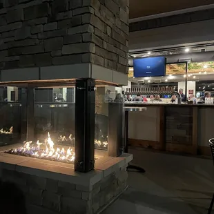 Outdoor space with open bar to the inside