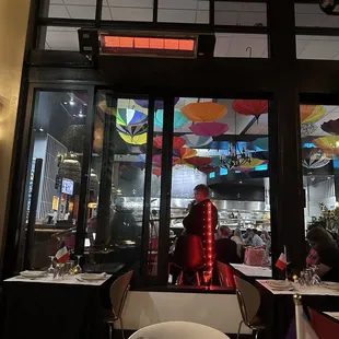 Outdoor seating with heat lamp