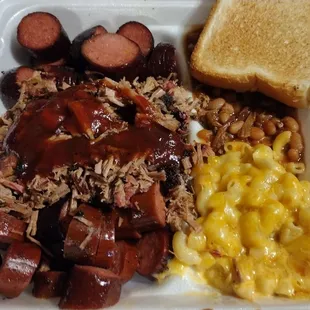 3 meat dinner with 2 sides and a drink.