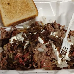 Loaded Baked Potato with Chopped Brisket!!  My new favorite!