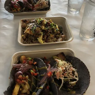 three plates of food on a table