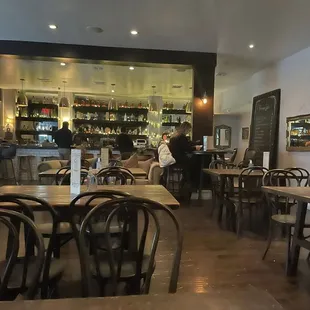 a restaurant with tables and chairs