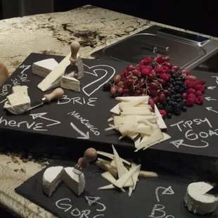 Globally Sourced Cheese Display on Chalkboard
