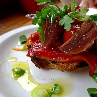 Poached Campari Tomatoes with Roasted Peppers and Anchovies