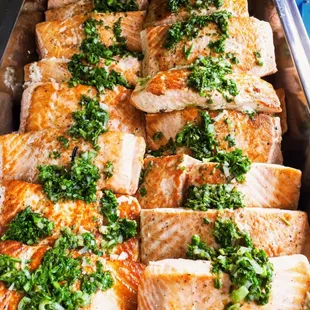 Wild caught Salmon, lemon, caper &amp; herb vinaigrette.