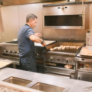 Executive Chef cooking salmon