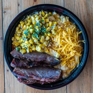 The brisket mash up with jalapeño cream, corn, and cheesy potatoes